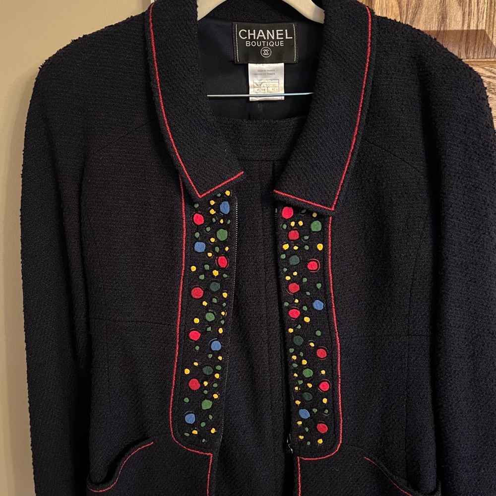 Authentic Chanel 1990s runway suit, boucle jacket and skirt.